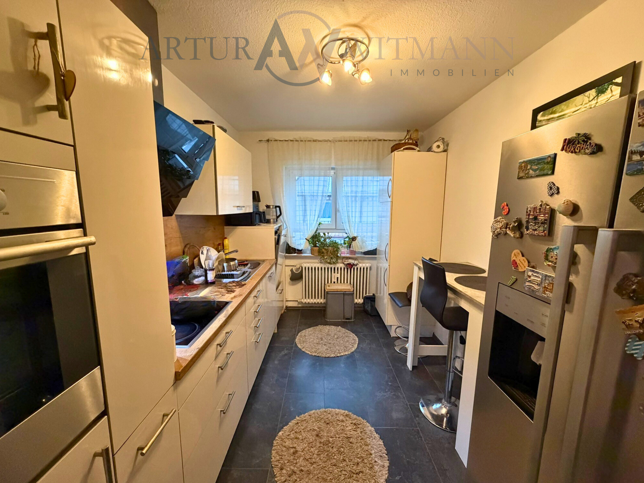 Zentrale 3-Zimmer-Wohnung mit Südbalkon & TG