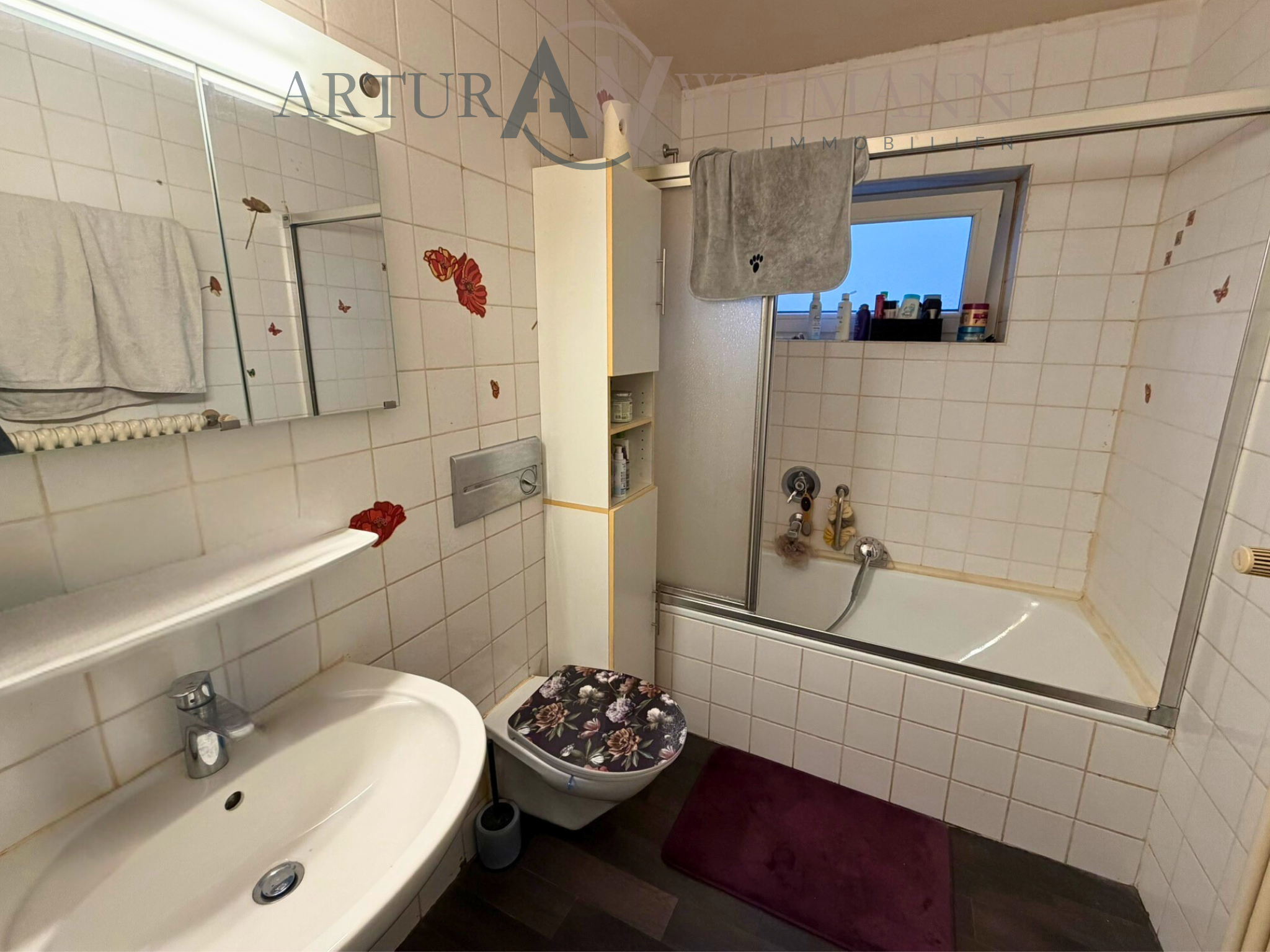 Zentrale 3-Zimmer-Wohnung mit Südbalkon & TG