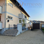 Charmante Maisonette-Wohnung mit Kamin, Einbauküche, Garage und Garten